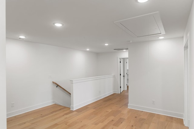 below grade area featuring baseboards, recessed lighting, light wood-style flooring, and visible vents