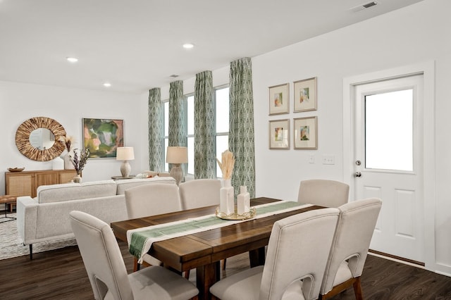 dining room featuring recessed lighting, plenty of natural light, dark wood finished floors, and visible vents