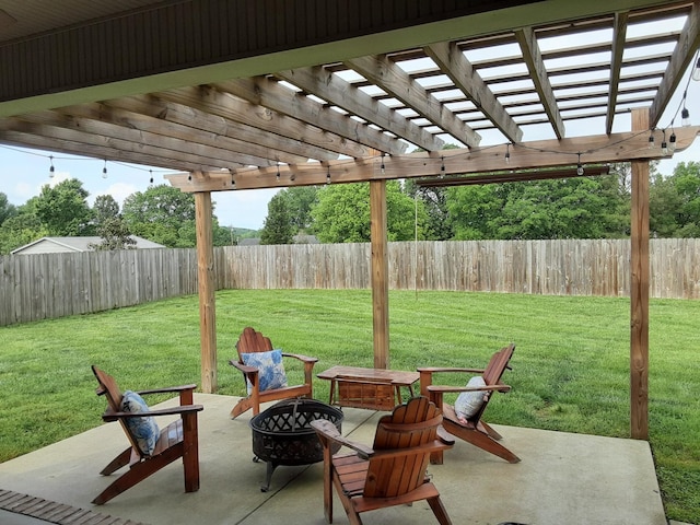 view of patio with a fenced backyard, a pergola, and an outdoor fire pit