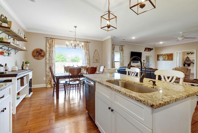 5014 Rainier Dr, Chapel Hill, TN 37034 - kitchen featuring a sink, stainless steel dishwasher, open shelves, open floor plan, and a center island with sink