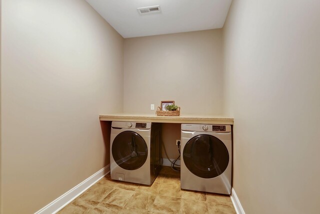 5014 Rainier Dr, Chapel Hill, TN 37034 - laundry room featuring washing machine and dryer and baseboards