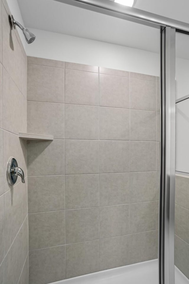 bathroom with a stall shower
