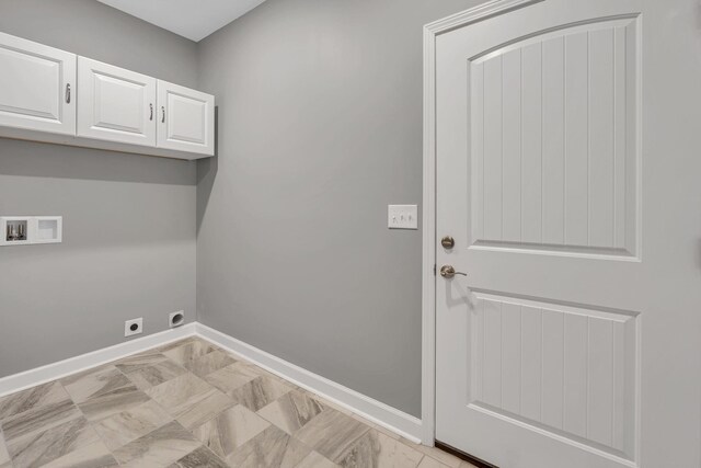 149 Watson Ct, Leoma, TN 38468 - laundry area featuring washer hookup, hookup for an electric dryer, baseboards, and cabinet space