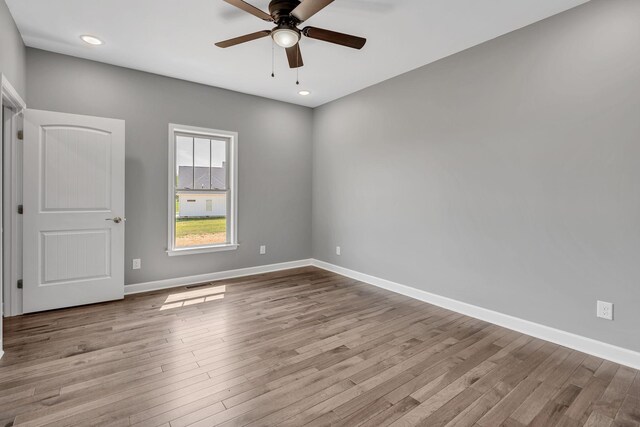 149 Watson Ct, Leoma, TN 38468 - spare room with a ceiling fan, baseboards, and wood finished floors