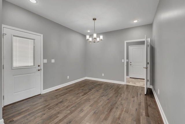 149 Watson Ct, Leoma, TN 38468 - unfurnished dining area featuring recessed lighting, a chandelier, visible vents, and dark wood-type flooring