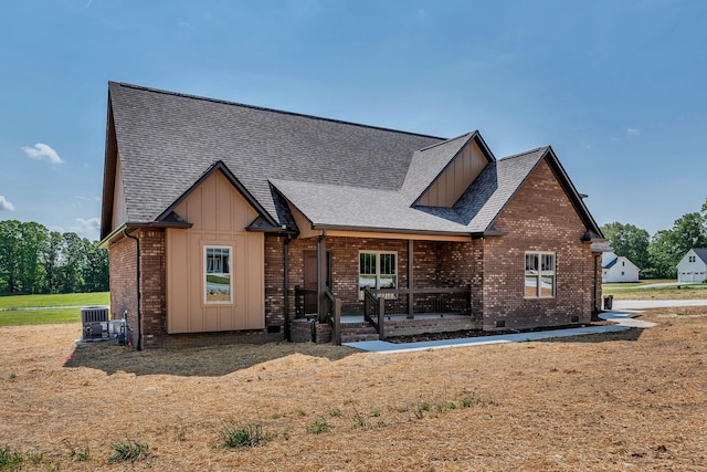 149 Watson Ct, Leoma, TN 38468 - view of front of home with a shingled roof, board and batten siding, and covered porch