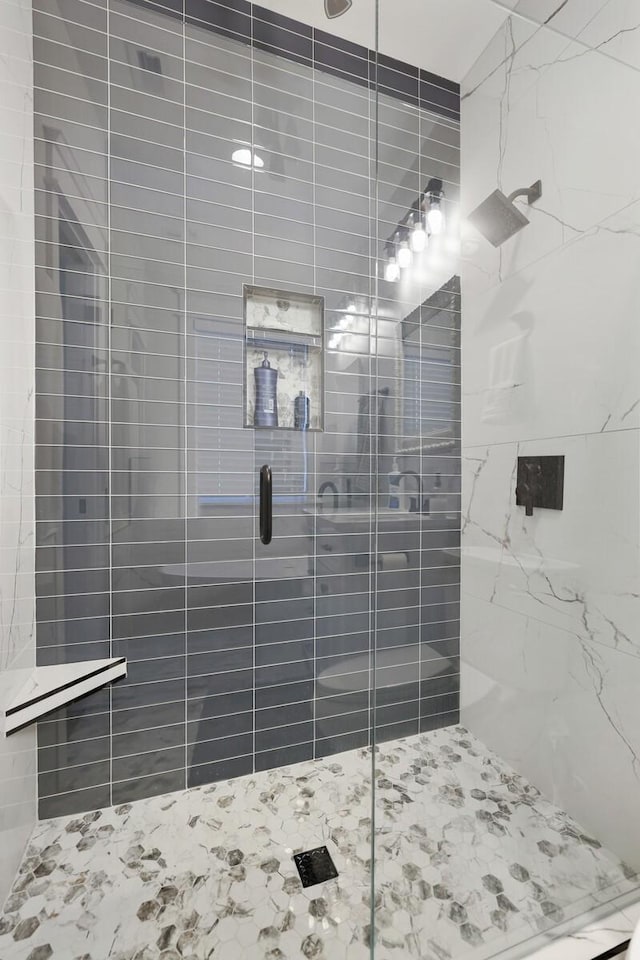 full bathroom featuring a stall shower