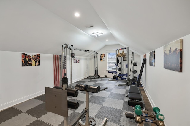 workout area featuring baseboards, visible vents, recessed lighting, and lofted ceiling
