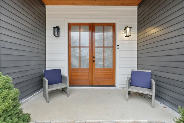 doorway to property featuring french doors