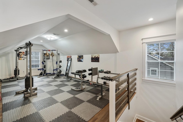 workout room with visible vents, baseboards, recessed lighting, carpet flooring, and vaulted ceiling