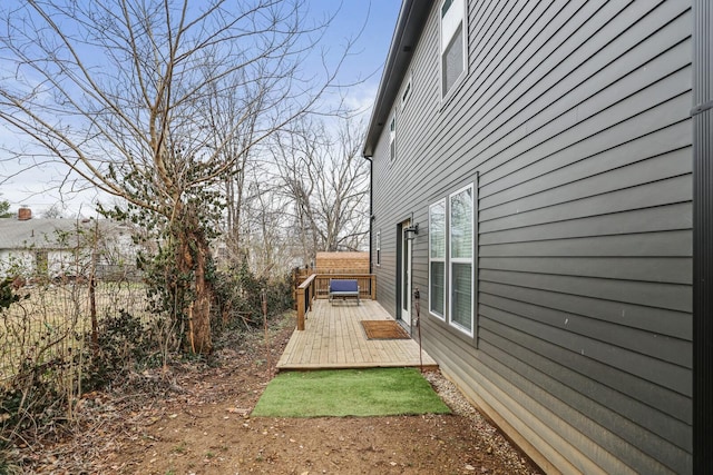 view of yard with a wooden deck