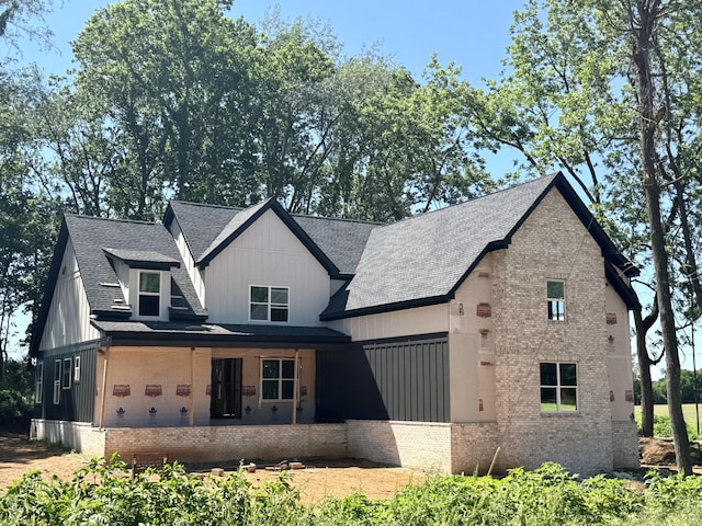 6463 Hopewell Rd, Springfield, TN 37172 - view of front of property with a shingled roof, brick siding, and board and batten siding