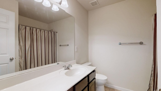 full bath featuring vanity, toilet, tile patterned floors, curtained shower, and visible vents