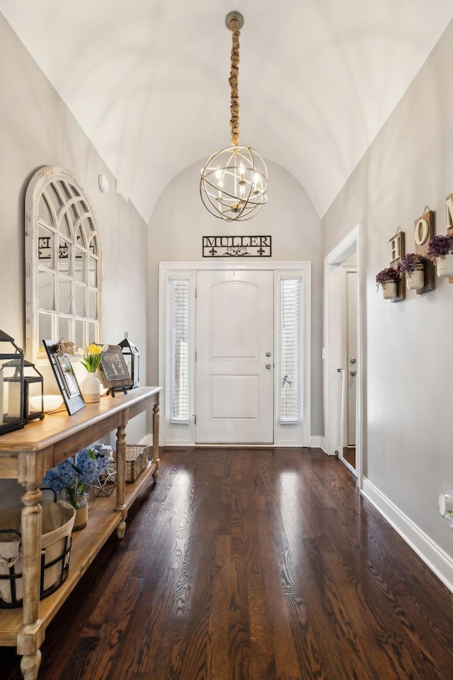141 Fieldcrest Cir, Hendersonville, TN 37075 - entryway with lofted ceiling, baseboards, a chandelier, and wood finished floors