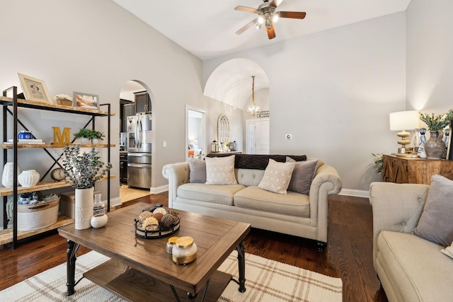 141 Fieldcrest Cir, Hendersonville, TN 37075 - living area with arched walkways, ceiling fan, vaulted ceiling, wood finished floors, and baseboards
