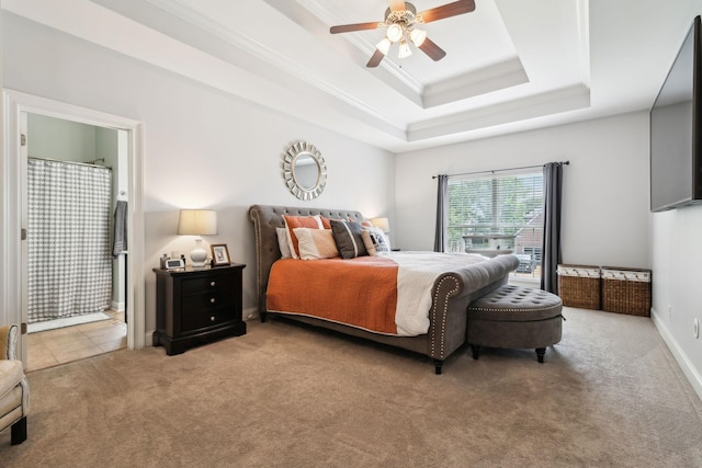 141 Fieldcrest Cir, Hendersonville, TN 37075 - carpeted bedroom with a tray ceiling, crown molding, ensuite bathroom, ceiling fan, and baseboards