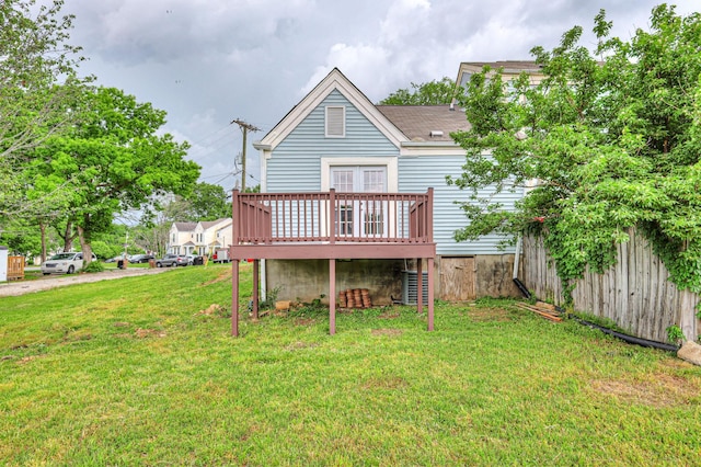 809 Lake Terrace Dr, Nashville, TN 37217 - back of property with french doors, roof with shingles, a lawn, a deck, and fence