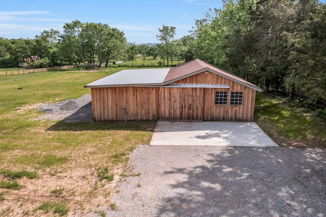 exterior space with a front lawn and board and batten siding