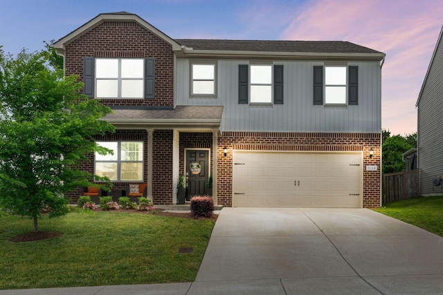 view of front of property featuring concrete driveway, a garage, brick siding, and a lawn