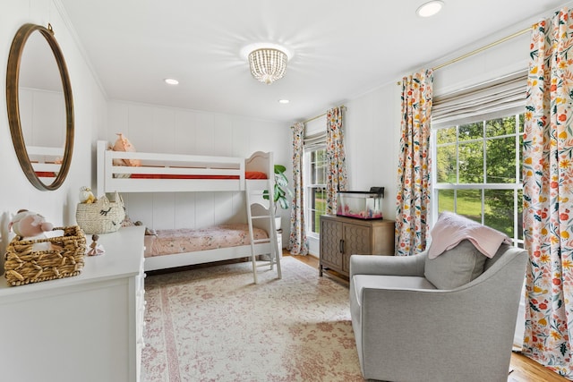 bedroom featuring recessed lighting and wood finished floors