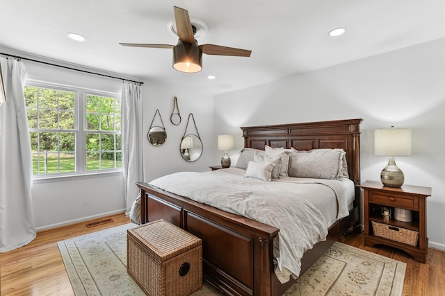 bedroom featuring baseboards, a ceiling fan, recessed lighting, and visible vents