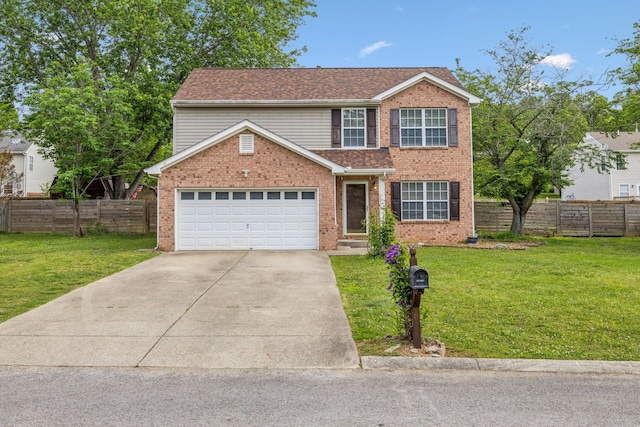 traditional-style house featuring concrete driveway, brick siding, fence, and a front yard