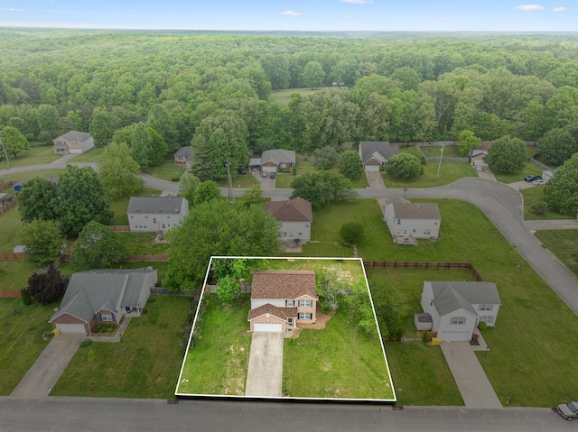 aerial view featuring a residential view and a forest view