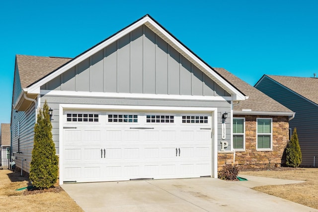 1034 Wilkinson Ln, White House, TN 37188 - craftsman-style home featuring concrete driveway, an attached garage, a shingled roof, and stone siding