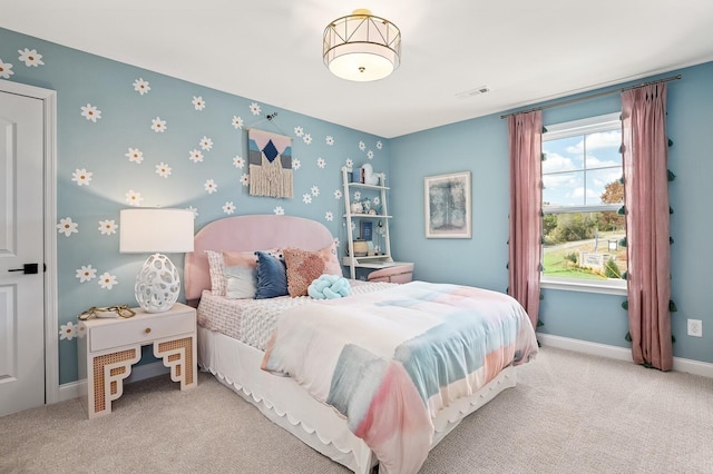 bedroom featuring visible vents, baseboards, and carpet floors