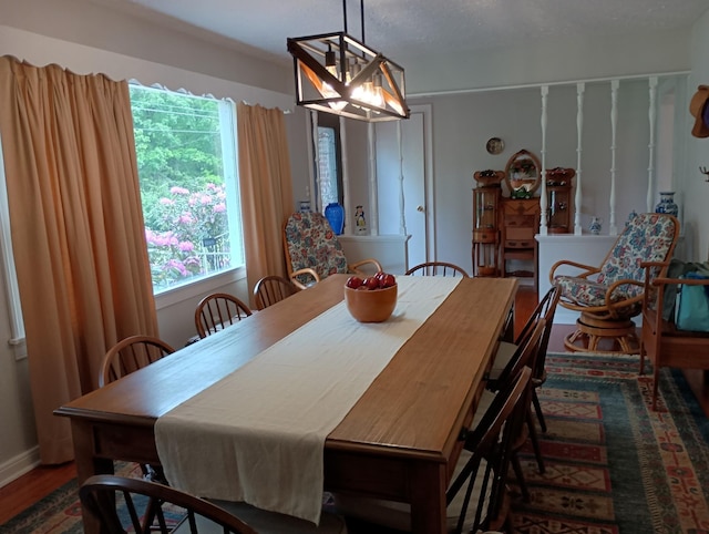 dining area featuring wood finished floors
