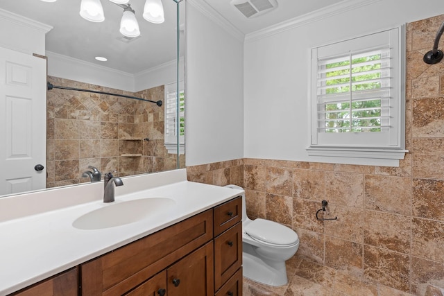 8224 Victory Trl, Brentwood, TN 37027 - bathroom featuring tile walls, crown molding, vanity, toilet, and tiled shower