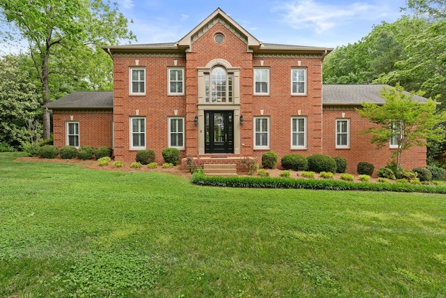 8224 Victory Trl, Brentwood, TN 37027 - colonial inspired home featuring a front lawn and brick siding
