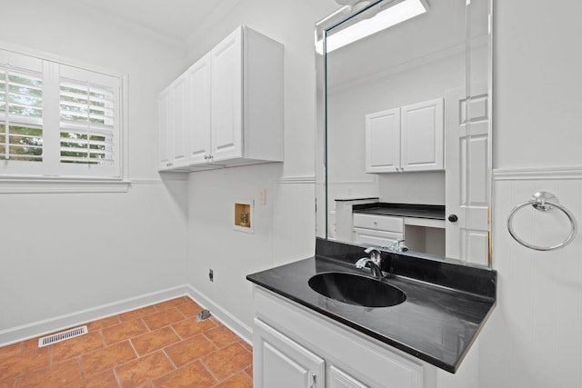 8224 Victory Trl, Brentwood, TN 37027 - laundry area featuring washer hookup, cabinet space, baseboards, light tile patterned floors, and electric dryer hookup