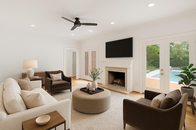 8224 Victory Trl, Brentwood, TN 37027 - living area with a ceiling fan, recessed lighting, french doors, light wood finished floors, and a fireplace with flush hearth