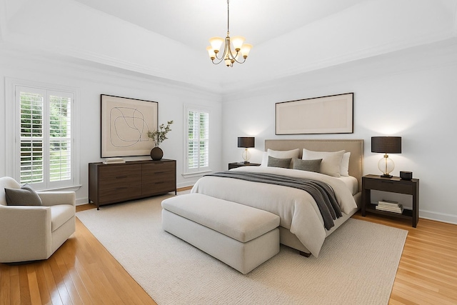 8224 Victory Trl, Brentwood, TN 37027 - bedroom with a chandelier, light wood finished floors, and baseboards