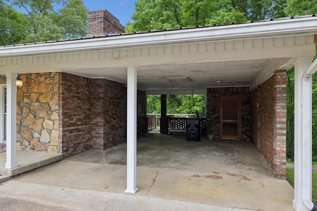 view of parking with an attached carport