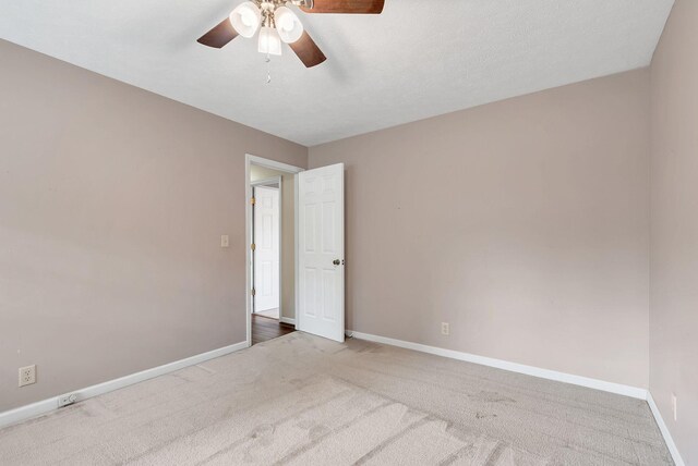 210 Edgewood Dr, Hohenwald, TN 38462 - carpeted empty room featuring baseboards and ceiling fan