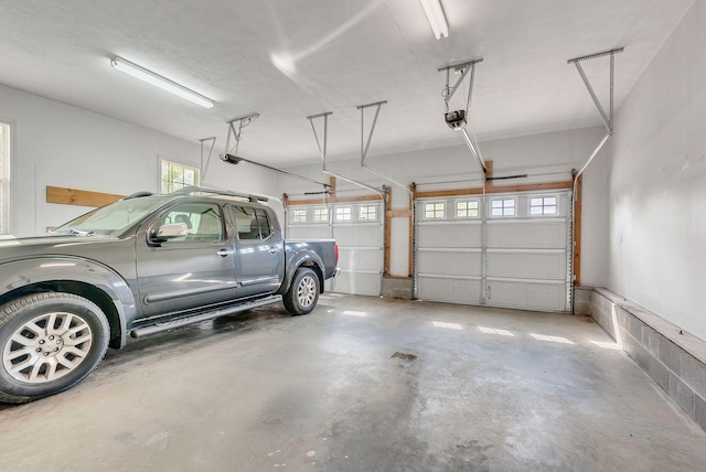 210 Edgewood Dr, Hohenwald, TN 38462 - garage featuring a garage door opener