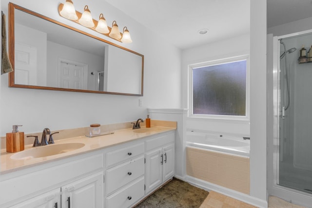 2011 Spring Meadow Cir, Spring Hill, TN 37174 - bathroom featuring double vanity, a bath, and a shower stall