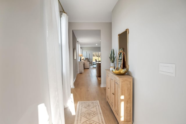 hall featuring light wood finished floors