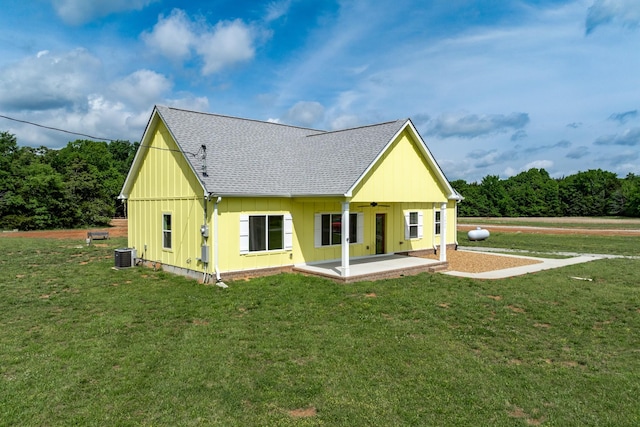 1317 Halls Mill Rd, Unionville, TN 37180 - rear view of house featuring central AC, a patio, roof with shingles, a ceiling fan, and a yard