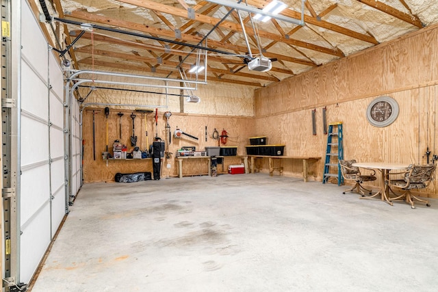 1317 Halls Mill Rd, Unionville, TN 37180 - garage with a garage door opener and a workshop area
