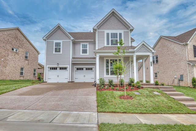 4013 Singing Creek Dr, Franklin, TN 37064 - craftsman house with covered porch, driveway, roof with shingles, a garage, and a front lawn