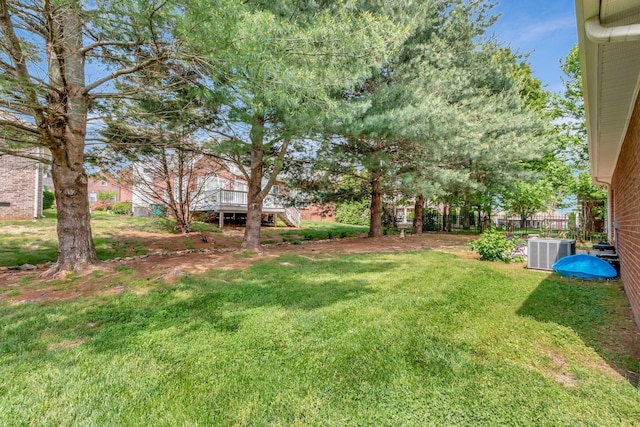 view of yard featuring central AC