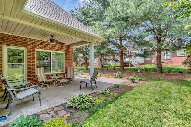 view of patio / terrace featuring a ceiling fan