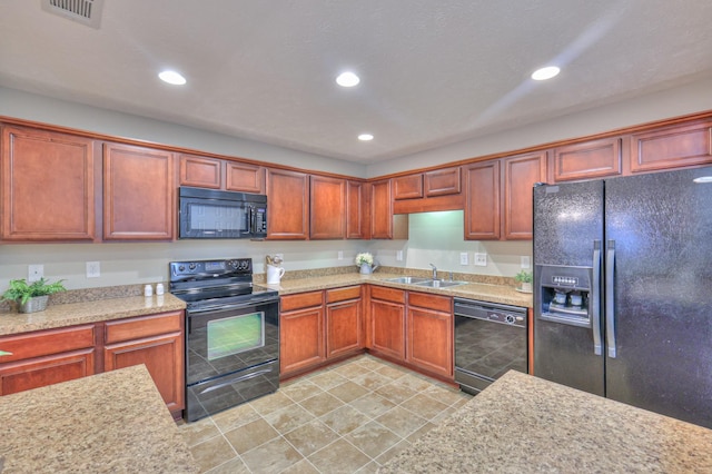 2039 Caladonia Way, Smyrna, TN 37167 - kitchen with visible vents, a sink, black appliances, and recessed lighting