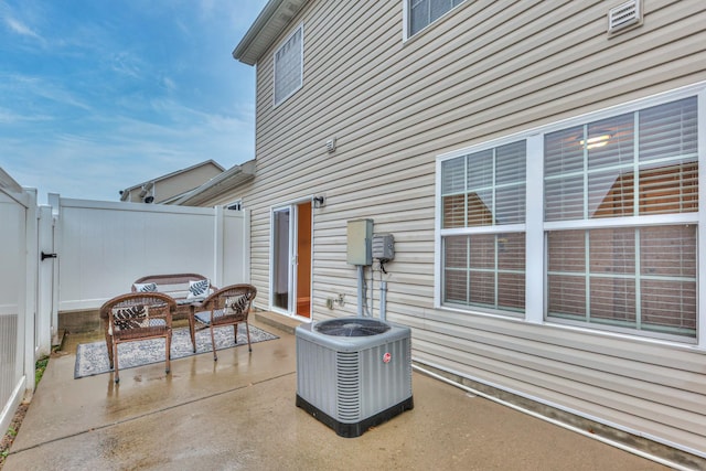 2039 Caladonia Way, Smyrna, TN 37167 - view of patio with fence, central AC unit, and a gate