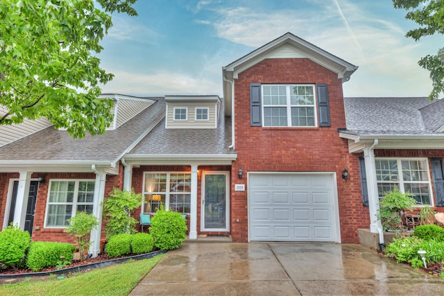 2039 Caladonia Way, Smyrna, TN 37167 - view of front of house featuring concrete driveway, brick siding, roof with shingles, and a garage