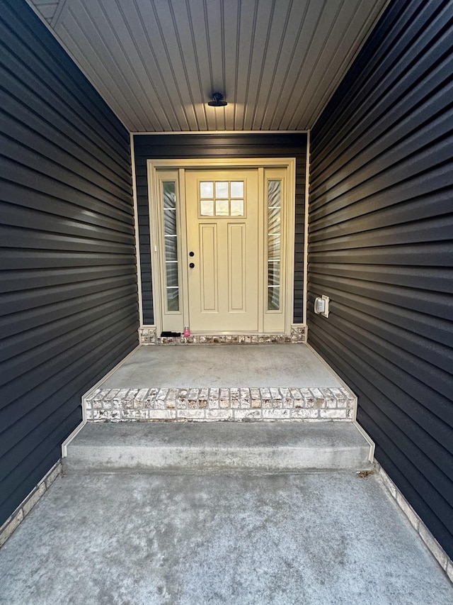 property entrance featuring covered porch