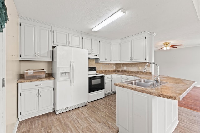 kitchen featuring a sink, electric range oven, white fridge with ice dispenser, a peninsula, and light wood-type flooring